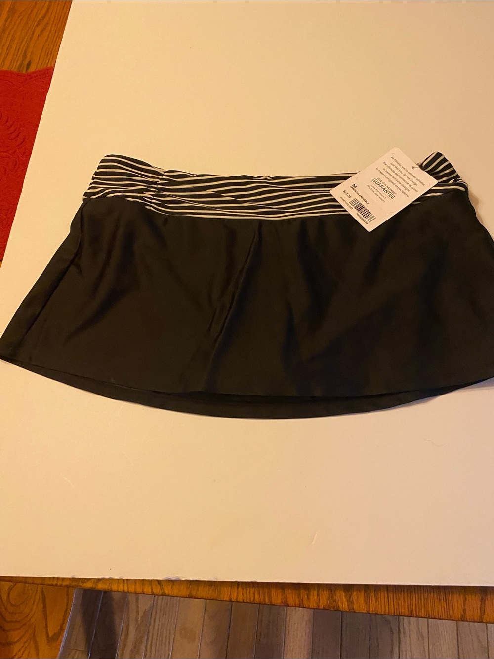 Athleta Black Skort or bathing suit bottom.